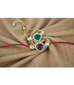 Combo of kundan rakhi and bracelet set for bhaiya bhabhi with roli chawal and written greeting note.