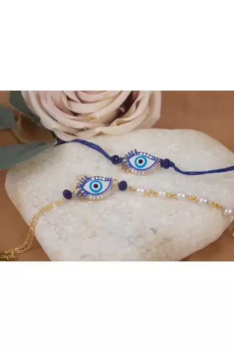 Handcrafted combo of couple pair evil eye protection rakhi for bhaiya bhabhi with roli chawal and written greeting note.