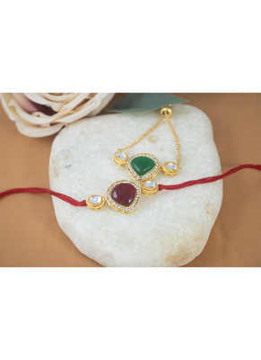 Combo of kundan rakhi and bracelet set for bhaiya bhabhi with roli chawal and written greeting note. 2