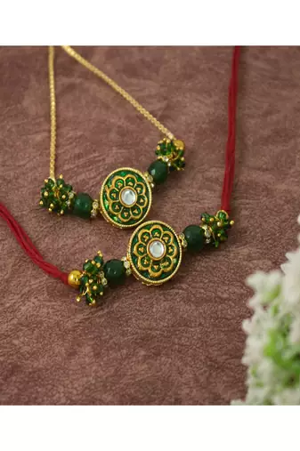 Handmade set of 2 green enamel and beaded unisex rakhi (lumba) for bhaiya bhabhi