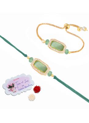 Mint green stone and crystal-studded unisex rakhi set for bhaiya bhabhi with roli chawal and written greeting note. 3