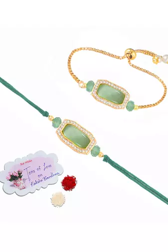 Mint green stone and crystal-studded unisex rakhi set for bhaiya bhabhi with roli chawal and written greeting note.