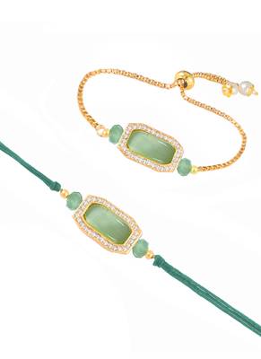 Mint green stone and crystal-studded unisex rakhi set for bhaiya bhabhi with roli chawal and written greeting note. 4
