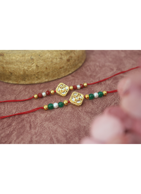 Traditional kundan with pearl and beads rakhi set for bhaiya with roli chawal and written greeting note. 1