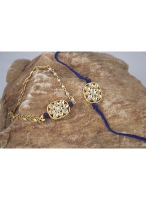 Combo of latest gold plated kundan rakhi for bhaiya bhabhi with roli chawal and written greeting note (blue). 2