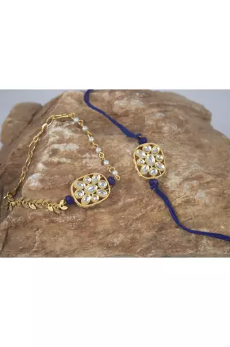 Combo of latest gold plated kundan rakhi for bhaiya bhabhi with roli chawal and written greeting note (blue).
