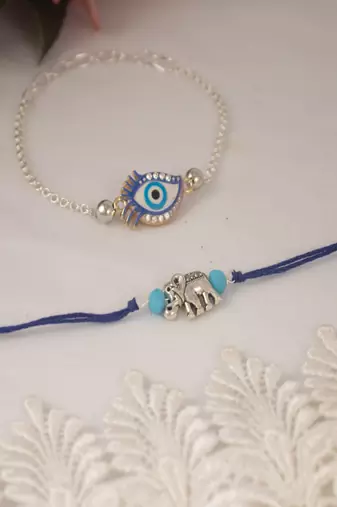 stylish blue thread & silver plated combo of unisex evil eye & elephant rakhi combo for bhaiya bhabhi