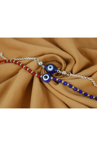 Combo of handcrafted evil eye unisex rakhi with silver and blue beaded design for bhaiya bhabhi