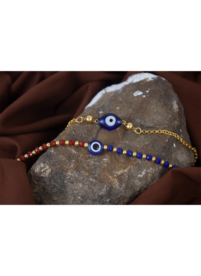 Combo of handcrafted evil eye unisex rakhi with gold and blue beaded design for bhaiya bhabhi 1