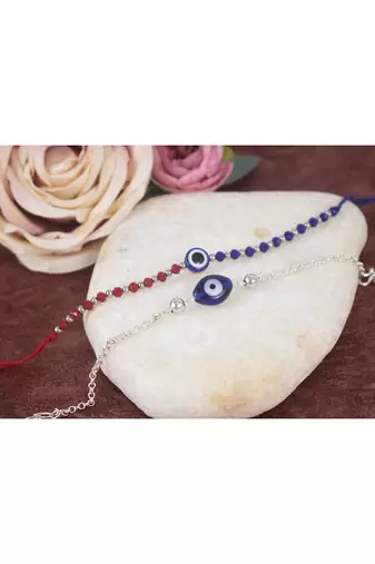 Combo of handcrafted evil eye unisex rakhi with silver and blue beaded design for bhaiya bhabhi