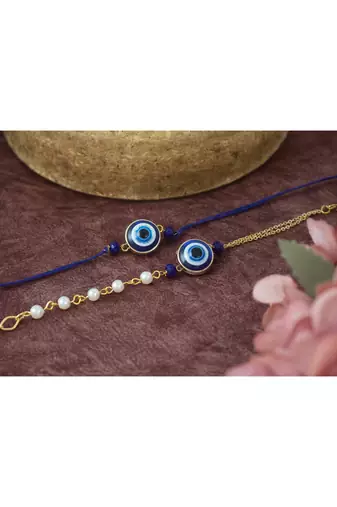 Combo of latest evil eye handcrafted couple pair rakhi for bhaiya bhabhi with roli chawal and written greeting note.