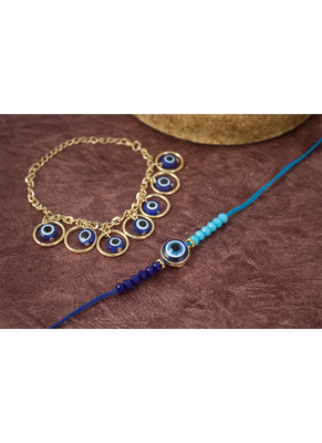 combo of fancy evil eye handcrafted protection  rakhi for bhaiya bhabhi with roli chawal and written greeting note. 2