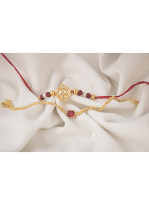 Combo of gold plated kundan couple pair rakhi raksha bandhan  with roli chawal and written greeting note. 1
