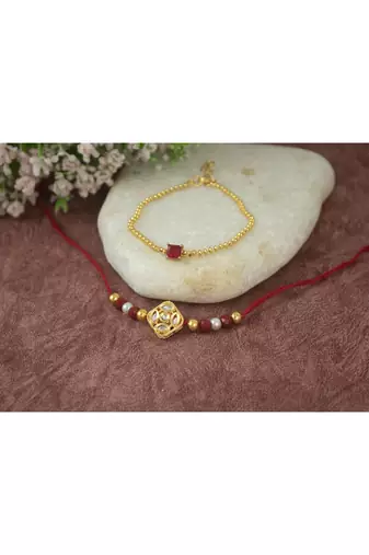 Combo of gold plated kundan couple pair rakhi raksha bandhan  with roli chawal and written greeting note.