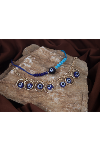 Handcrafted combo of evil eye protective rakhi for bhaiya bhabhi with roli chawal and written greeting note.