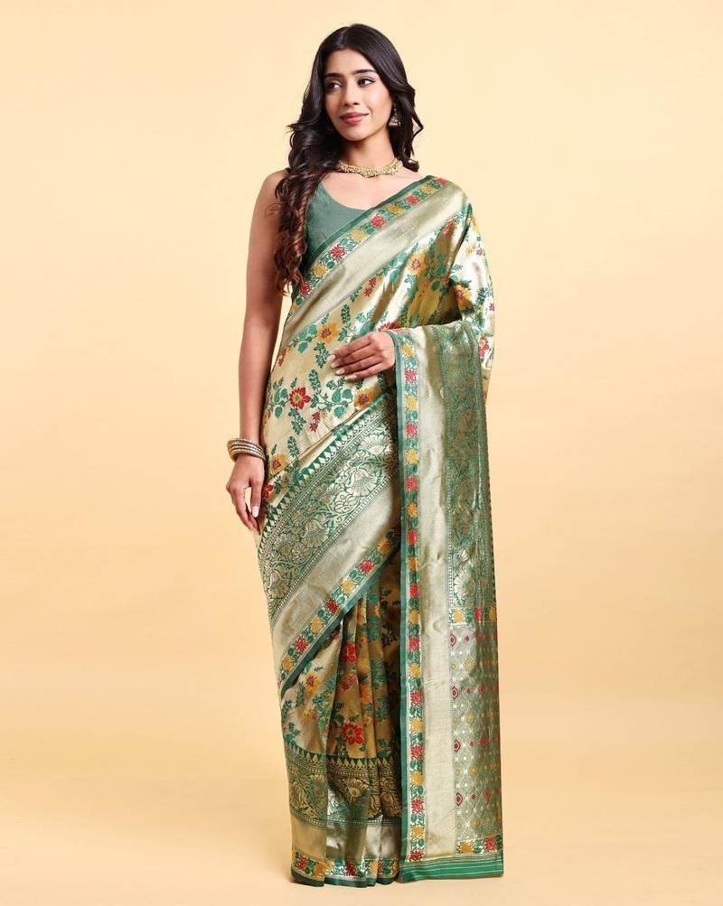 Golden and green zari woven floral pattern saree with blouse piece