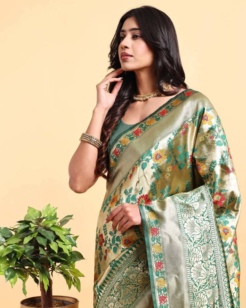 Golden and green zari woven floral pattern saree with blouse piece