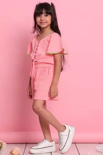 Girls' peach co-ord set     front-knot short sleeve top with matching shorts