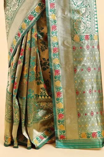 Golden and green zari woven floral pattern saree with blouse piece
