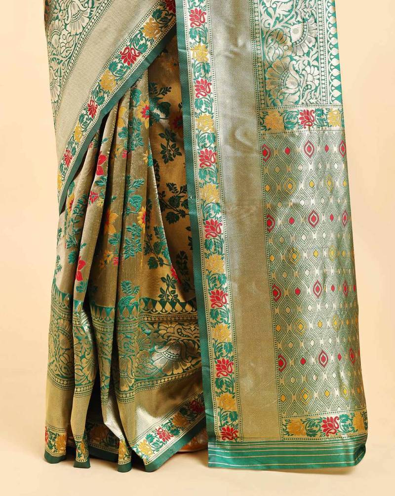 Golden and green zari woven floral pattern saree with blouse piece