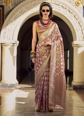 Light peach tissue art silk with zari weaving wedding wear saree 1