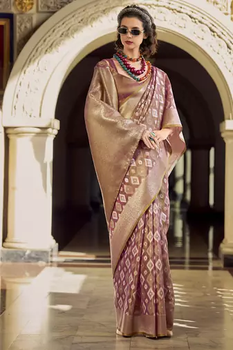 Light peach tissue art silk with zari weaving wedding wear saree