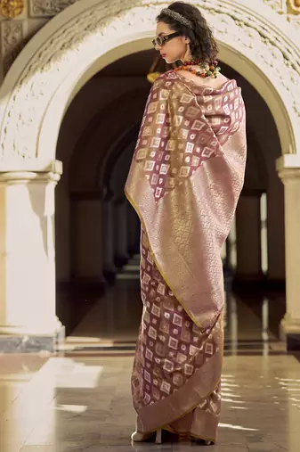 Light peach tissue art silk with zari weaving wedding wear saree