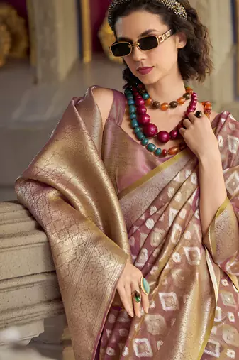 Light peach tissue art silk with zari weaving wedding wear saree