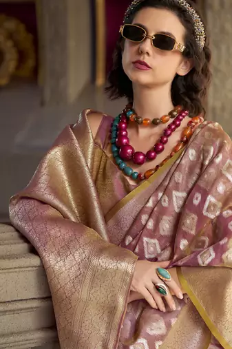 Light peach tissue art silk with zari weaving wedding wear saree