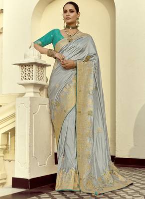 Light gray dola silk heavy zari weaving cut dana work and designer contrast blouse wedding sarees 1