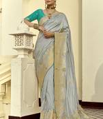 Light gray dola silk heavy zari weaving cut dana work and designer contrast blouse wedding sarees