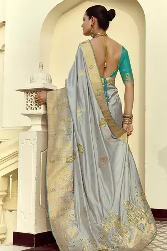 Light gray dola silk heavy zari weaving cut dana work and designer contrast blouse wedding sarees