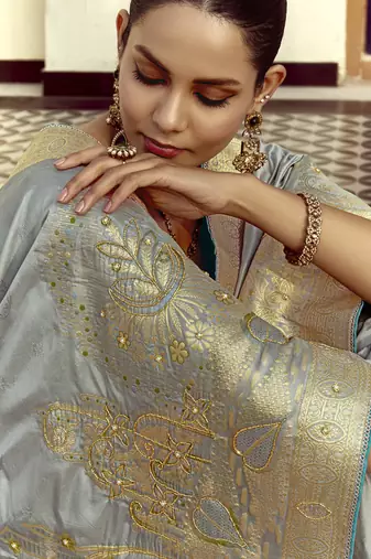 Light gray dola silk heavy zari weaving cut dana work and designer contrast blouse wedding sarees