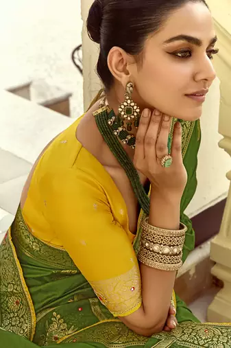Green dola silk heavy zari weaving cut dana work and designer contrast blouse wedding sarees