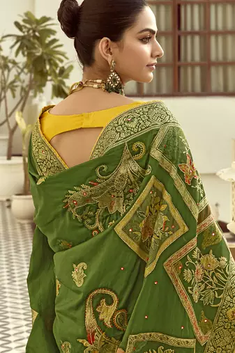 Green dola silk heavy zari weaving cut dana work and designer contrast blouse wedding sarees