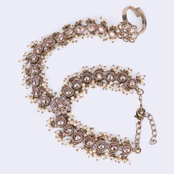 gold plated pearl hathphool set with floral & oval design  4