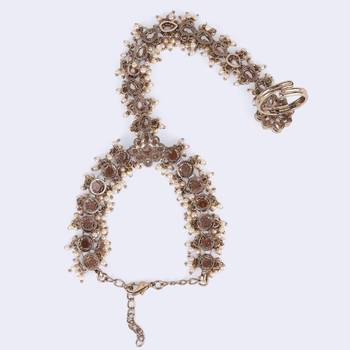 gold plated pearl hathphool set with floral & oval design  5
