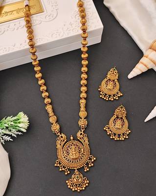 Antique gold plated temple jewelry necklace set with lakshmi pendant and earrings for bridal and ethnic wear 1
