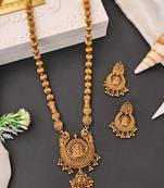 Antique gold plated temple jewelry necklace set with lakshmi pendant and earrings for bridal and ethnic wear