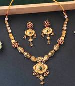 Ethnic gold floral necklace set with red and green enamel accents