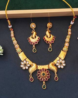 Peacock inspired ethnic necklace set with floral and stone detailing 1