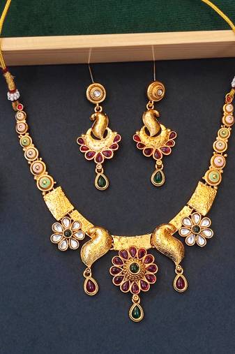 Peacock inspired ethnic necklace set with floral and stone detailing