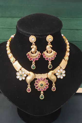 Peacock inspired ethnic necklace set with floral and stone detailing