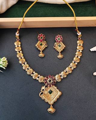 Floral pendant antique necklace set with ruby and green stones 1