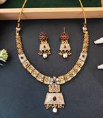 Temple inspired bell pendant necklace set with pearl drops