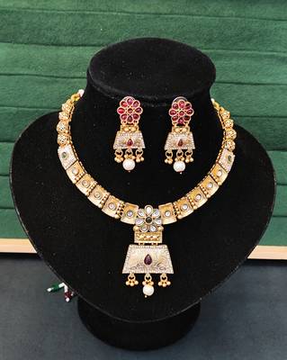 Temple inspired bell pendant necklace set with pearl drops 3