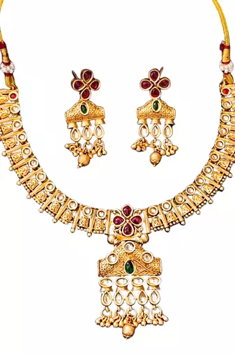 Traditional floral pendant necklace set with red and green stones and dangling beads