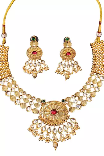 Beautiful gold-plated kundan necklace and earrings set with red and green stones, pearl accents for her