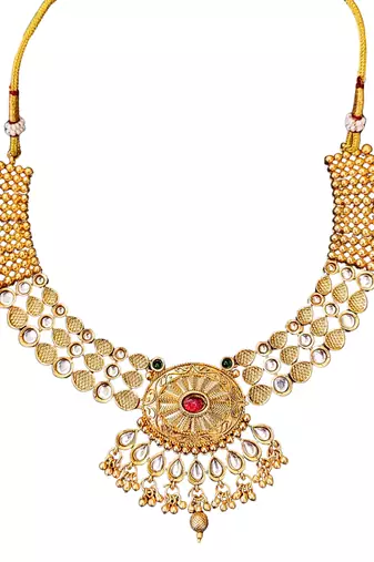 Beautiful gold-plated kundan necklace and earrings set with red and green stones, pearl accents for her