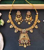 Indian style kundan necklace set with earrings, gold-plated with green and red stones for her